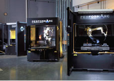 Three performarc robotic welding systems in a large room