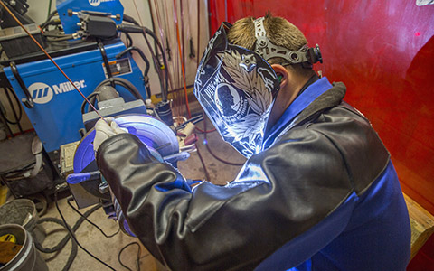Team Fabricators employee pipe welding