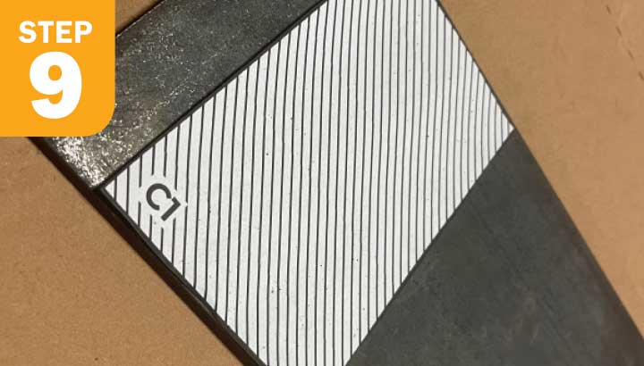 A flat piece of 1/8 inch steel with pattern on it to cut.